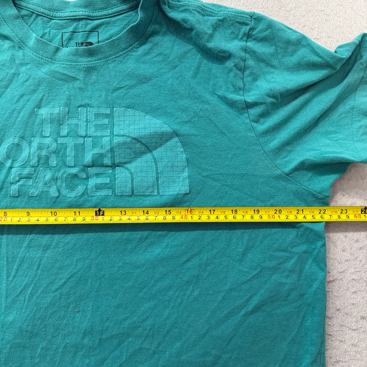 The North Face teal tee chest measurement