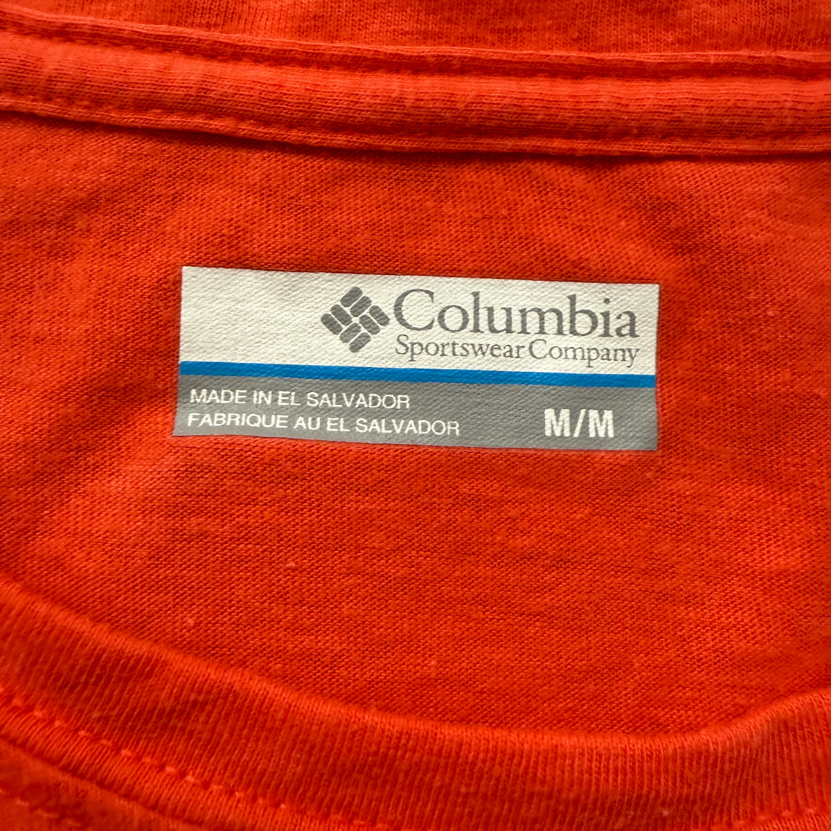 Columbia orange tee brand and size tag