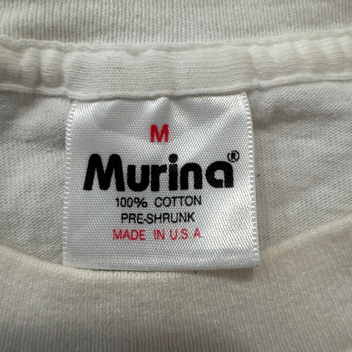 Murina Florida tee brand tag