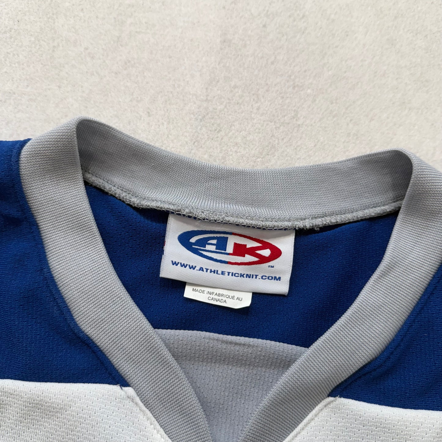 Athletic Knit Men's White Blue Striped Polyester Mesh Hockey Jersey Logo Size L