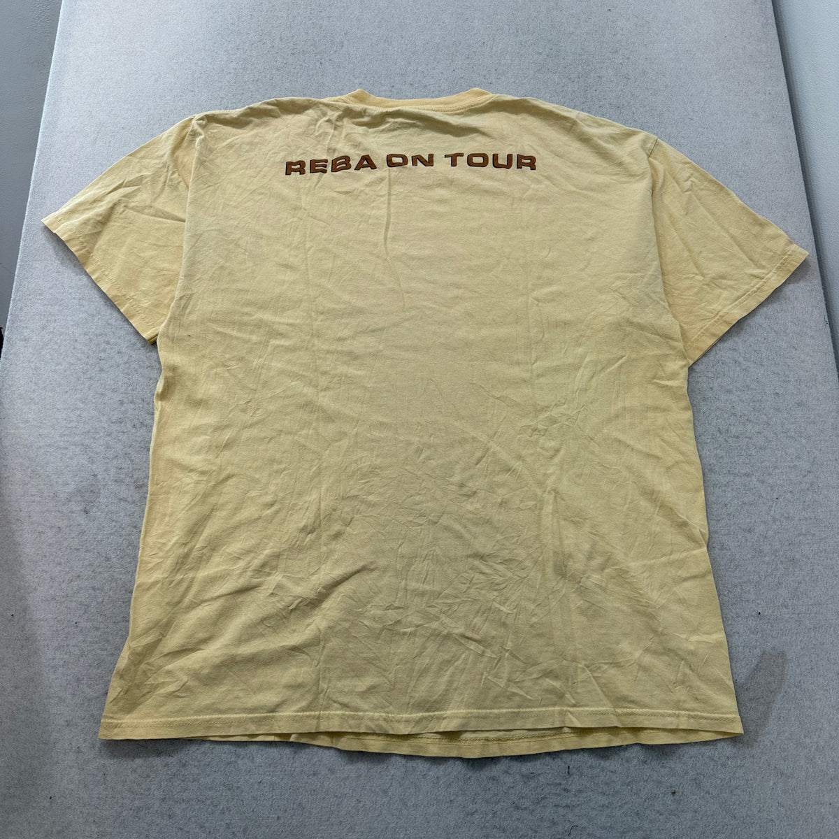 Reba McEntire yellow portrait tee back