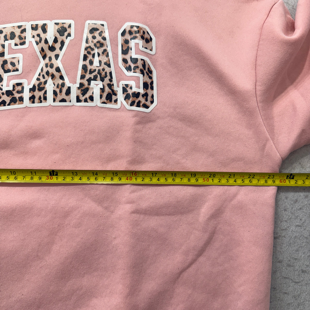 TEXAS sweatshirt brand tag