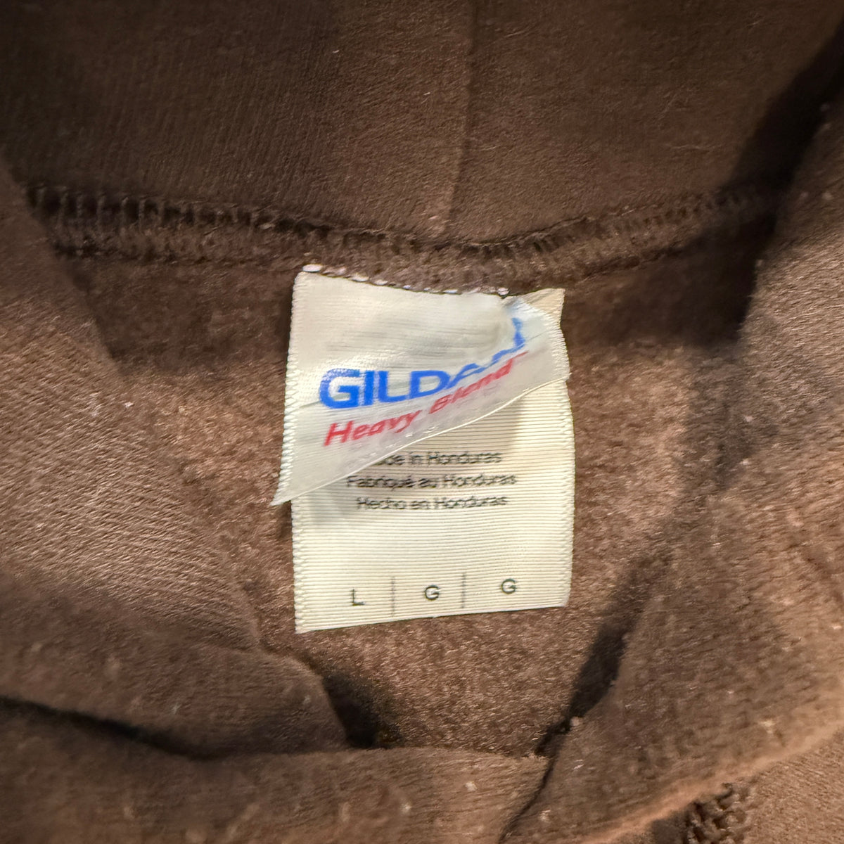 Gildan The Land hoodie brand tag