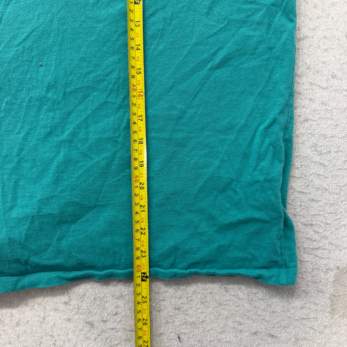 The North Face teal tee length measurement