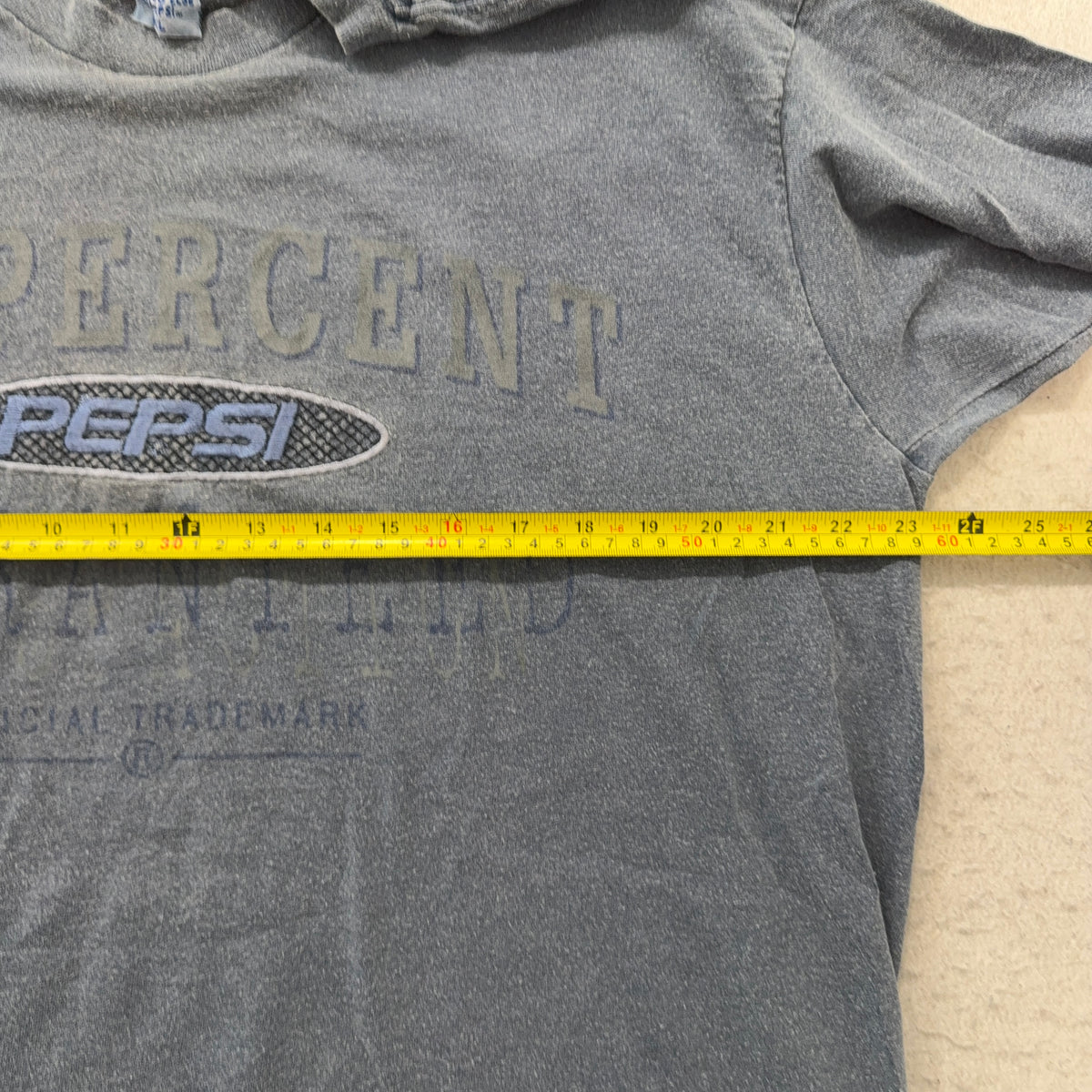 Pepsi tee pit-to-pit measurement about 23.5 inches