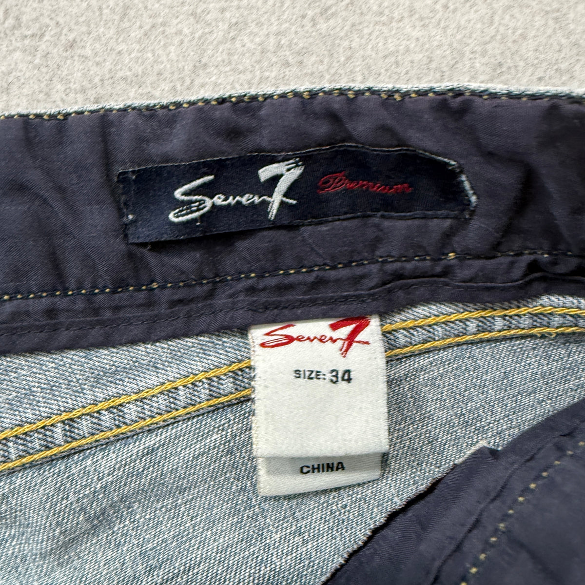 Seven7 Premium Womens Blue Bootcut Jeans Embroidered Pockets Distressed Hem - 34