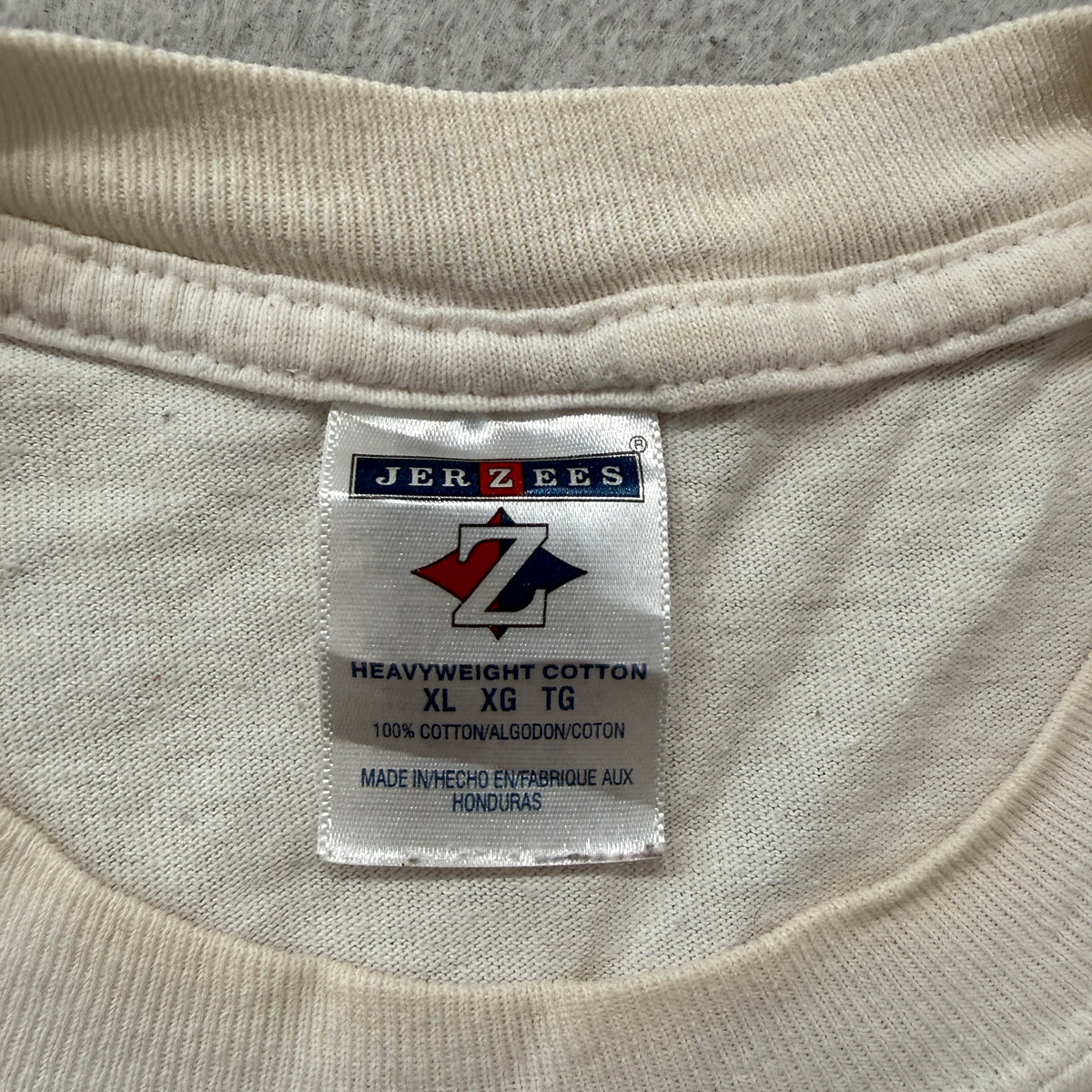 Jerzees rivalry tee brand tag