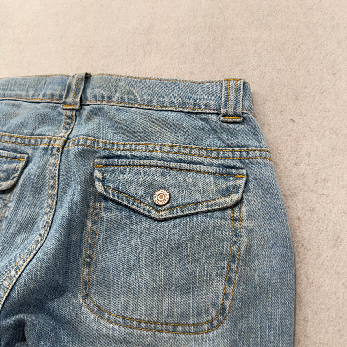 Gap Long and Lean Flare Jeans light wash blue detail view