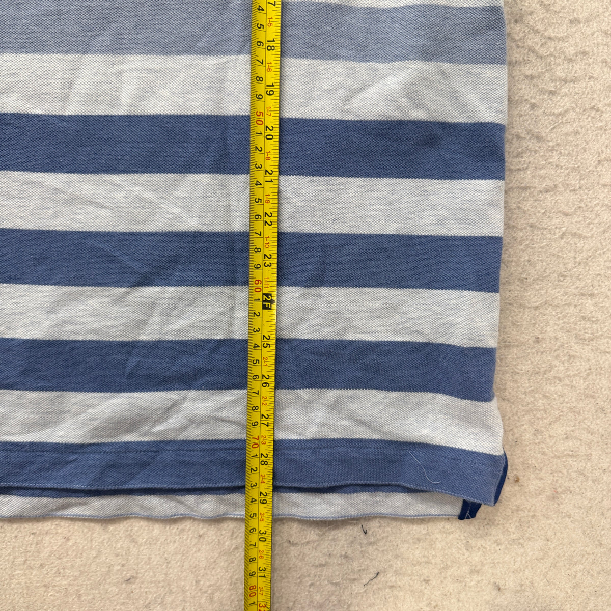 Nike polo length measurement