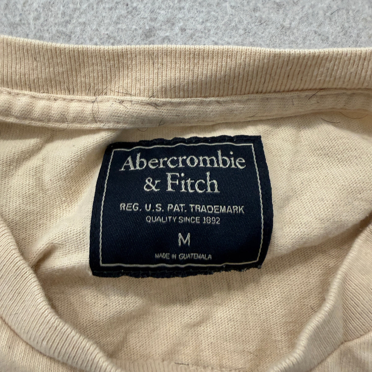 Abercrombie and Fitch cream tee brand and size tag