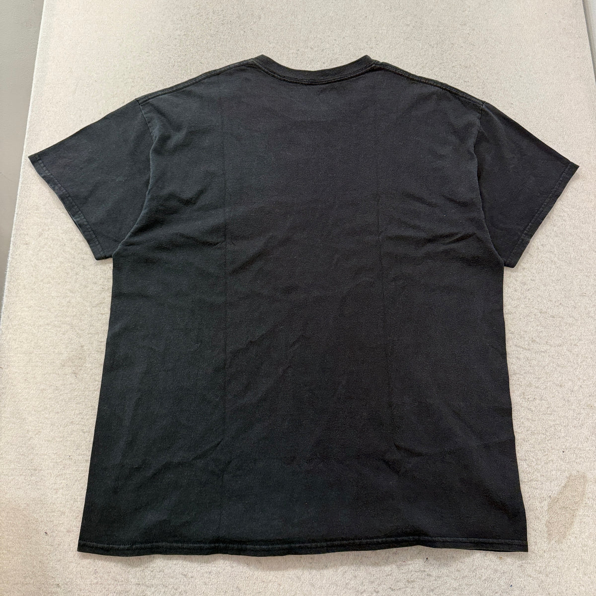 Black oversized skull graphic tee back view