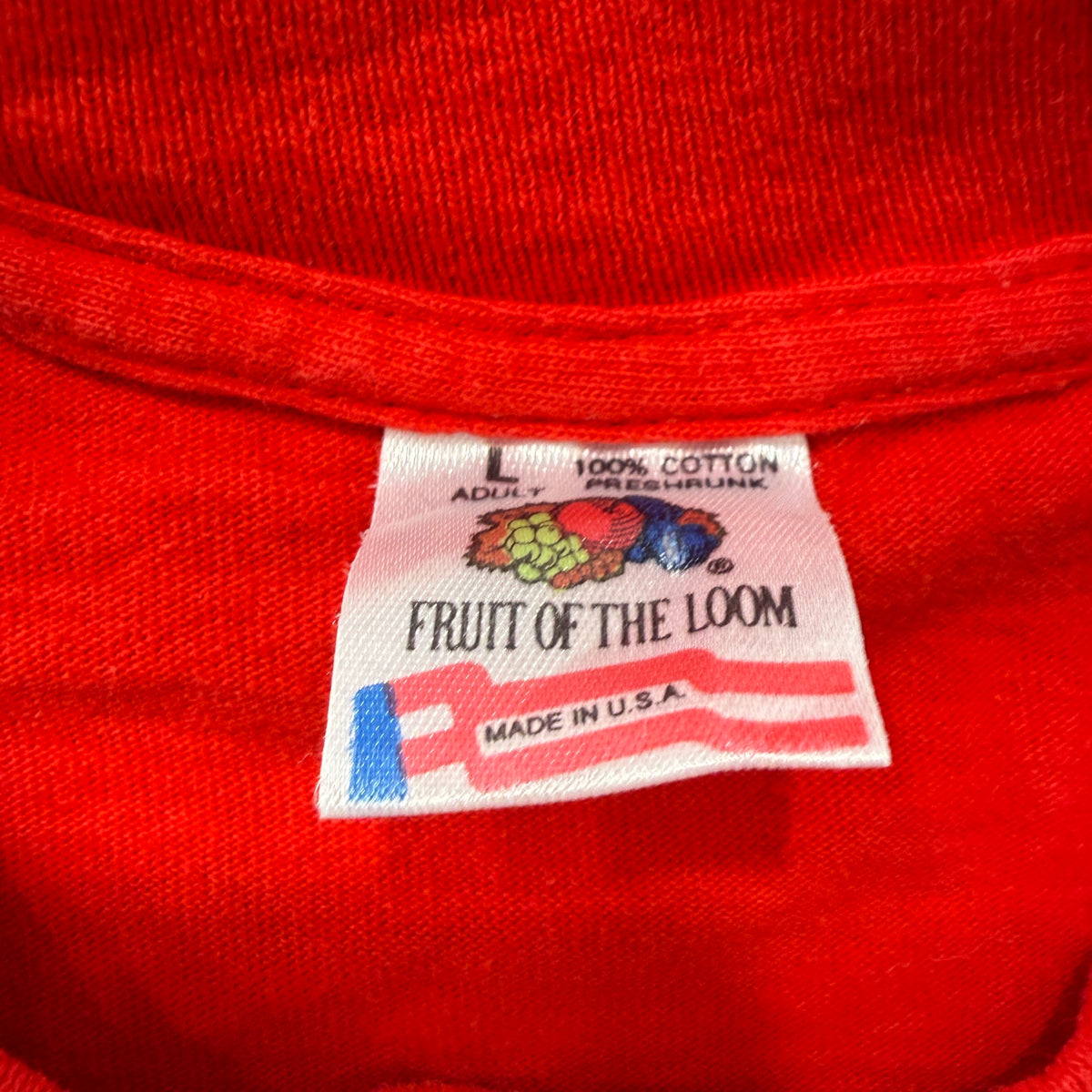 P-40 Warhawk red tee brand and size tag