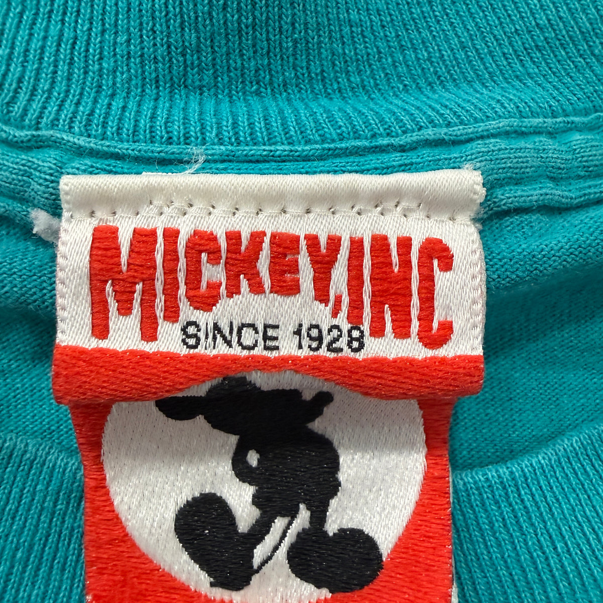 Mickey Inc brand tag
