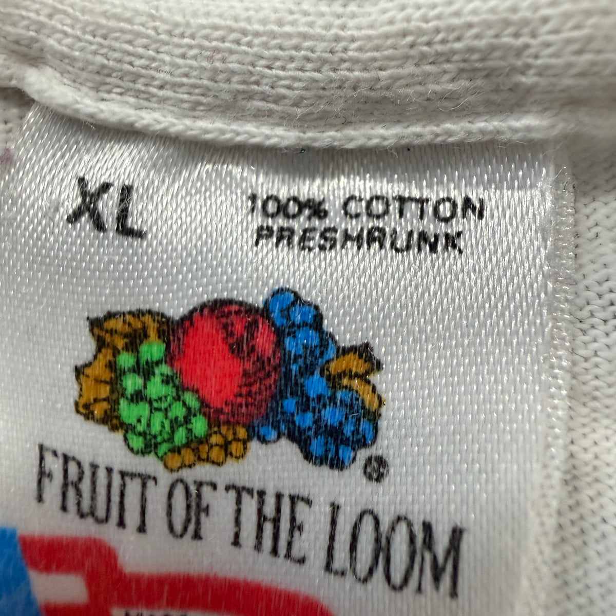 Lotus 1991 tee brand and size tag