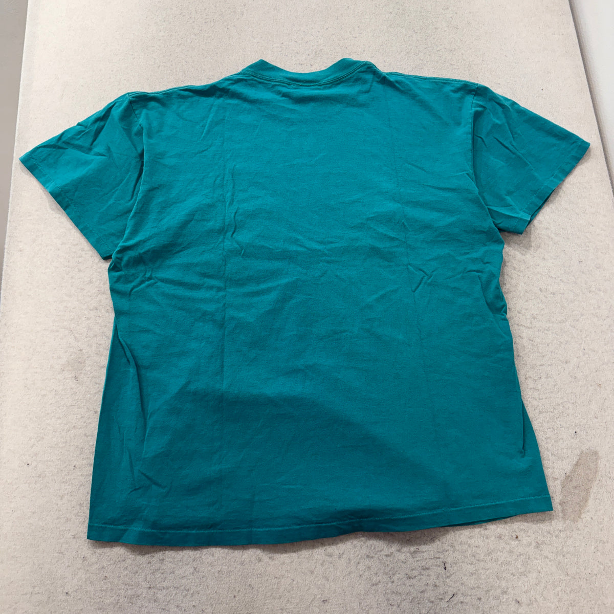 Mickey Inc teal Disney tee back