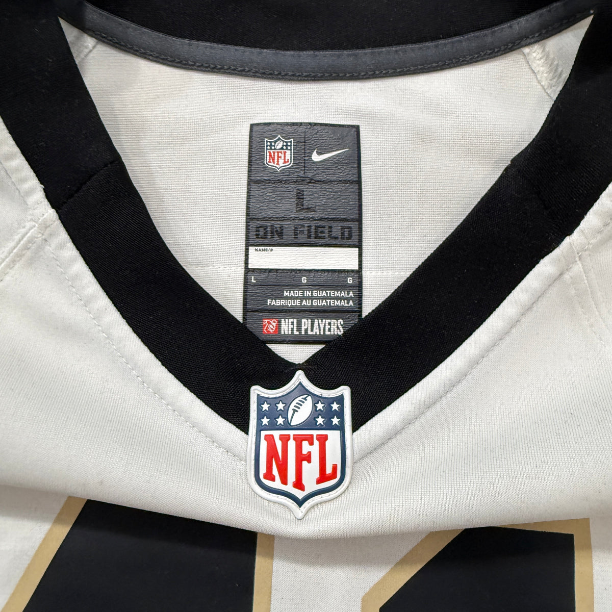Nike Saints jersey brand tag