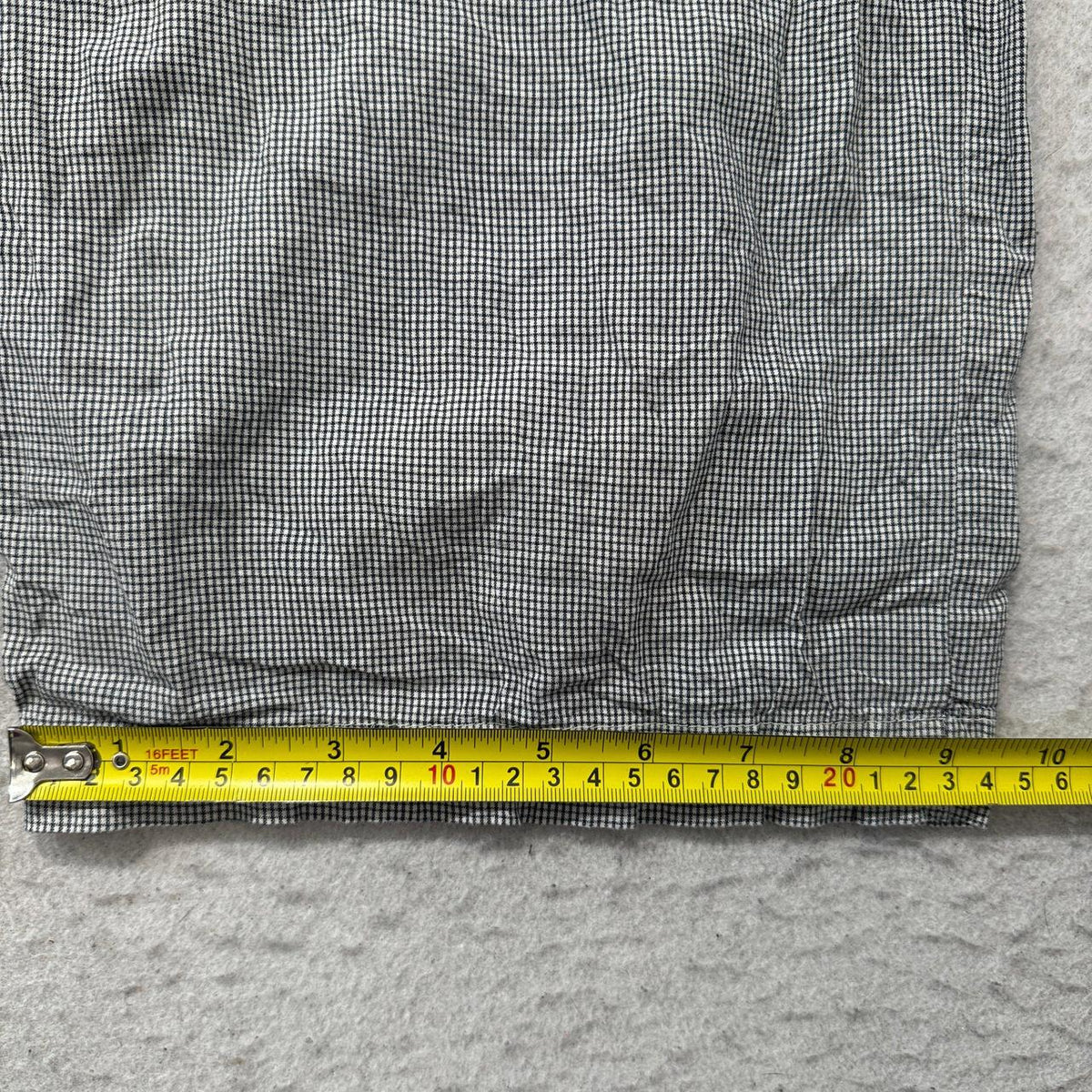 Vintage Polo by Ralph Lauren Men's Grey Pajamas with Button Fly Closure Size L is a classic sleepwear piece that reflects the brand's renowned preppy and elegant aesthetic. The set is likely crafted from a soft and comfortable fabric, such as cotton or a