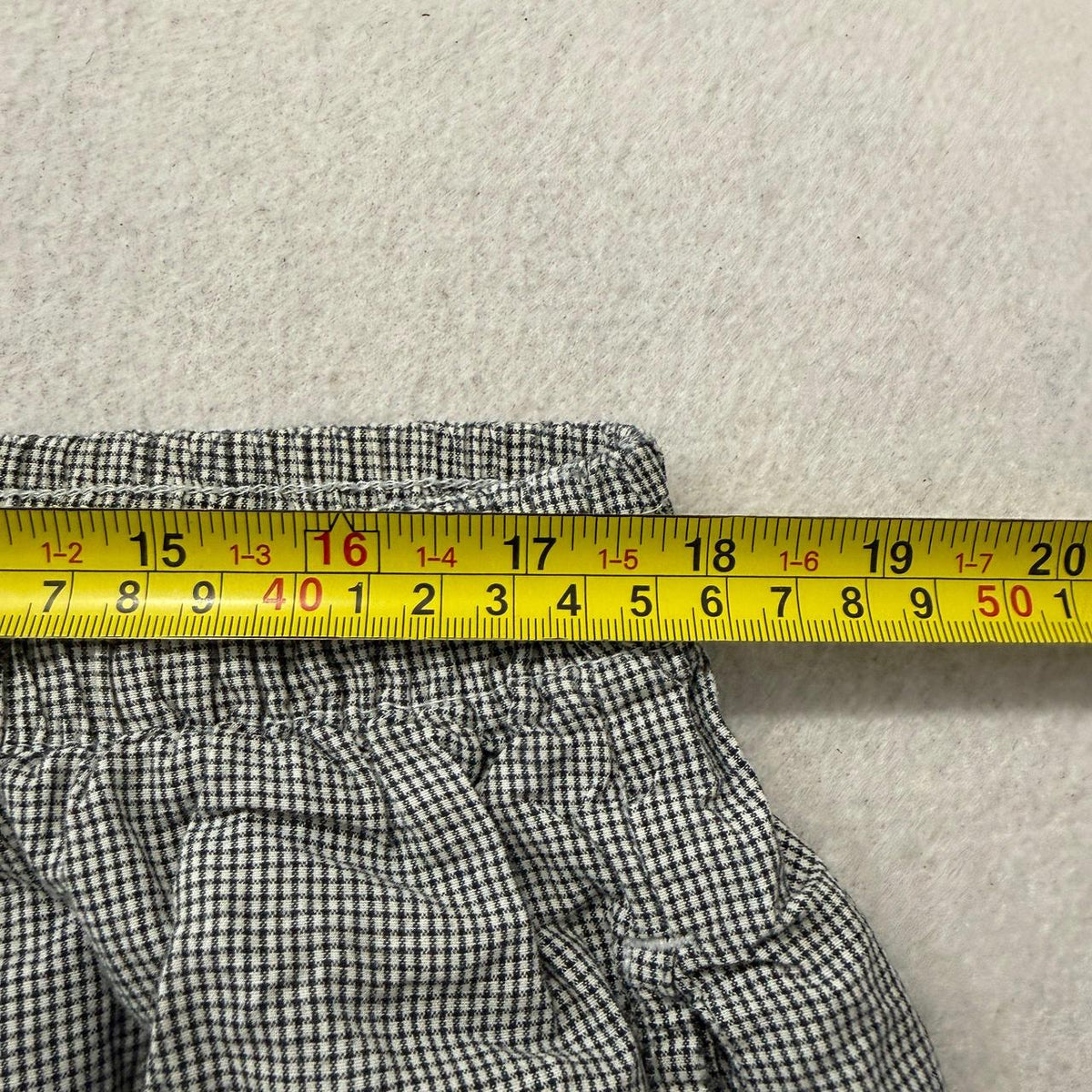 Vintage Polo by Ralph Lauren Men's Grey Pajamas with Button Fly Closure Size L is a classic sleepwear piece that reflects the brand's renowned preppy and elegant aesthetic. The set is likely crafted from a soft and comfortable fabric, such as cotton or a